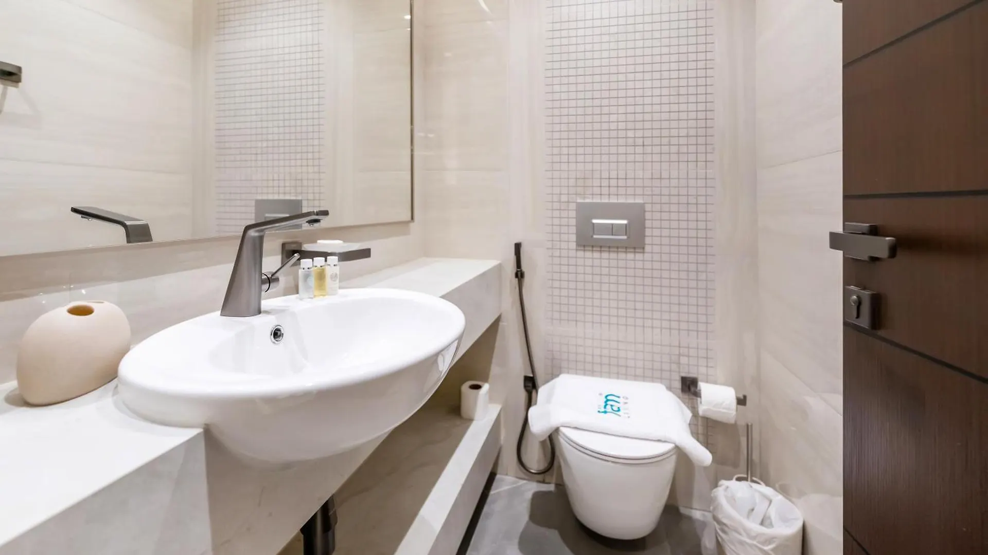 Апартаменты Fam Living - Nobles Tower, Brandnew 2B, Burj Views Дубай